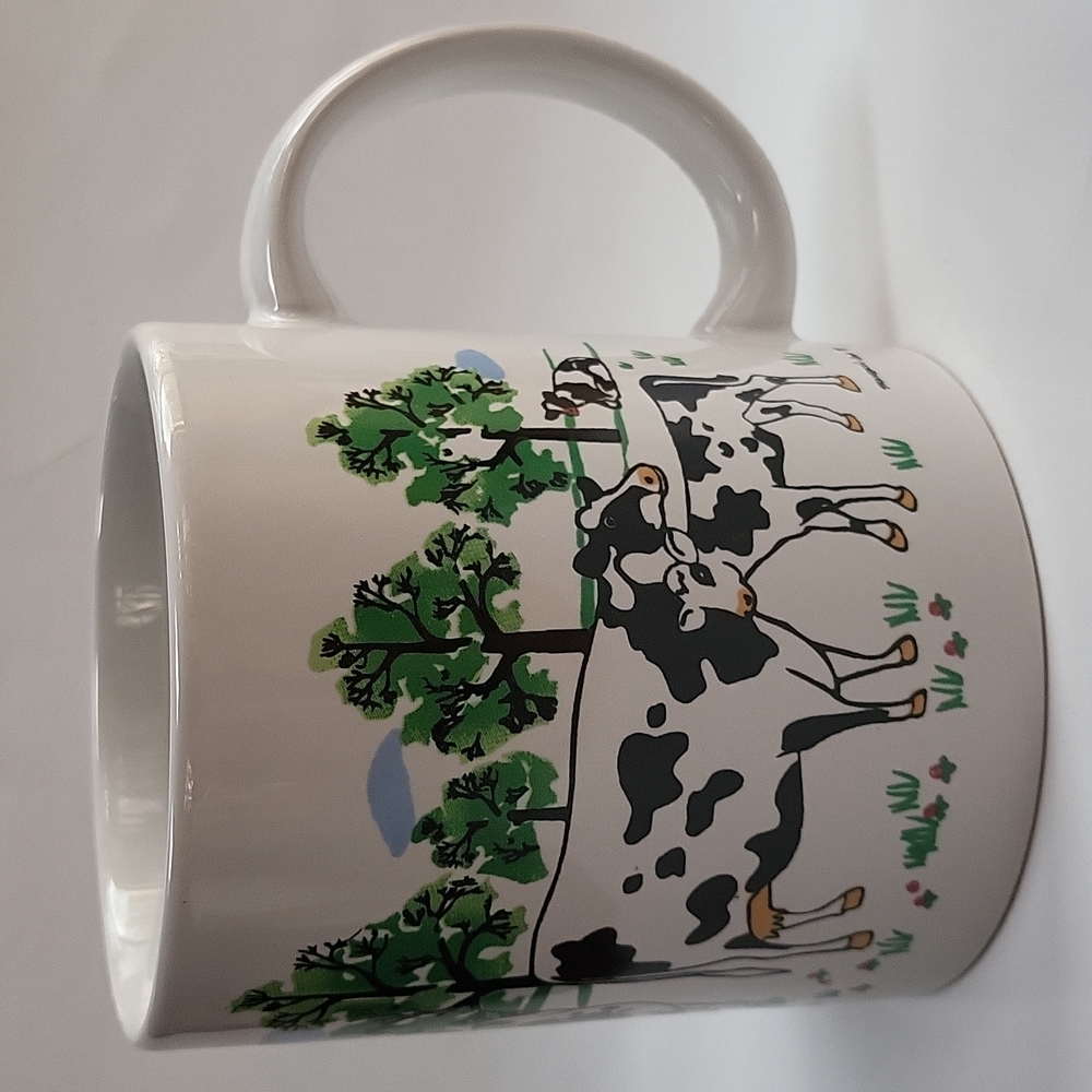 Tranquel Lands Cows Relaxing In The Field On A Ceramic White Coffee Mug
